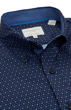 Microdots bring elevated appeal to a short-sleeve shirt that features a slim fit and four-way stretch. 28" length (size Medium) Button-down collar Short sleeves Four-way-stretch fabric 86% polyester, 14% spandex Machine wash, line dry Imported Fitted Polka Dot Shirt For Spring, Fitted Short Sleeve Shirt With Buttons, Fitted Polka Dot Shirt For Work, Fitted Polka Dot Collared Shirt, Short Sleeve Dress Shirt, Slim Fit Shorts, Button Front Shirt, Nordstrom Store, Button Down Collar