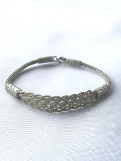 Unisex Silver Braided Bracelet, Silver Unisex Bracelet, Unique Braided Bracelet, Braided Unisex Bracelet, Silver Bracelet for Her and Him Make yourself or your loved ones happy with this beautiful braided bracelet. This woven bracelet jewelry complete your style with a special touch. Color: Silver Size: Choose size in drop-down menu. Material: 1000 Carat Silver Technique: Kazaziye silver jewelry made by hand with only 1000 carat silver or 24 carat gold. A strand of 1000 carat silver or 24 carat Silver Braided Bangle Bracelets, Adjustable Braided Bangle Bracelet With Sterling Silver Clasp, Elegant Braided Sterling Silver Bracelet Gift, Formal Adjustable Braided Bracelets, Formal Adjustable Braided Bracelet, Silver Braided Bracelet For Gift, Elegant Braided Bracelet Jewelry, Elegant Braided Jewelry As Gift, Elegant Braided Jewelry For Gifts