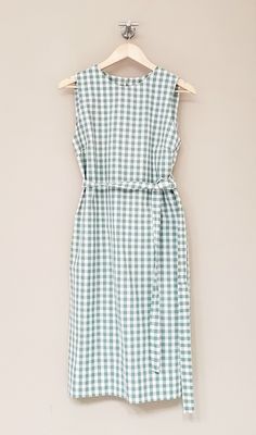 "Gingham sleeveless Dress / Handmade by littleflowerfabric / 100% Cotton Dress / Lightweight / Pullover / Handmade STYLE * Fits neatly across the shoulders. * Gentle, shape that floats subtly away from the body. * No zipper, pullover. * Right above bust including armhole up to neckline is lined with the same fabric as blouse for fit. DETAILS * Made with Cotton 100%, 140 gsm * Manufacturer: Fableism Supply Company * Collection: Camp Gingham PLEASE NOTE * Made to order. Hand made. Neither returnable nor exchangeable. * All garments are approximate as to be expected with the handmade. PLEASE CHECK * The measurements carefully. (Especially the body BUST measurements) The most important thing is the measurement of the bust size. FIT * Order your usual size. * Model wears Small size / Model 5' 5 Fitted Sleeveless Dresses For Picnic, Green Cotton Midi-length Sleeveless Dress, Green Cotton Midi Length Sleeveless Dress, Green Cotton Sleeveless Midi Dress, Fitted Casual Sleeveless Dress For Picnic, Plaid Sleeveless Dress For Picnic, Sleeveless Plaid Dress For Picnic, Picnic Sleeveless Plaid Sundress, Chic Cotton Sleeveless Dress For Garden Party