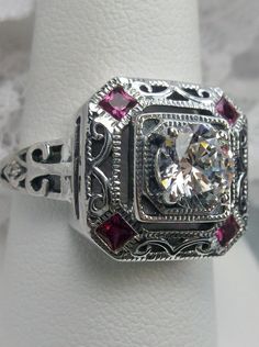 art deco style ring with a white CZ center stone and 4 ruby red gems in each corner of the octagonal filigree Star Ruby Ring, Art Deco Revival, Angel Princess, Mystic Fire Topaz, Natural Ruby Ring, Antique Filigree, Art Deco Movement, Ring Ruby, Gems Art