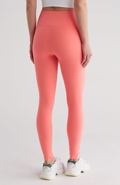 Work out or chill out in these smoothing high-waist leggings offered in an assortment of appealing hues. 24" inseam; 8 1/2" leg opening; 11" front rise; 14 1/2" back rise (size Medium) 79% polyamide, 21% elastane Machine wash, tumble dry Imported Trendy Stretch Solid Color Leggings, Trendy Tight Leggings, Versatile High Rise Solid Leggings, High Waist Solid Tight Leggings, Solid Tight High-waist Leggings, Solid Color Tight High-waist Leggings, Solid Color Elastane Leggings For Loungewear, High Stretch Solid Leggings For Loungewear, Solid High-stretch Leggings For Loungewear