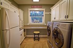 a washer and dryer in a small room