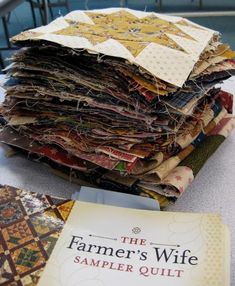 the farmer's wife sample quilts are stacked on top of each other and ready to be sewed