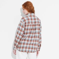 Flannel button-down shirt from Wild Fable™ with a plaid pattern. Made from lightweight cotton. Designed in an oversized fit with a collared neckline, full front button-down closure, chest patch pocket and long sleeves with buttoned cuffs. Tunic-length shirttail hem completes the stylish look. If you're not satisfied with any Target Owned Brand item, return it within one year with a receipt for an exchange or a refund. Wild Fable™: A look for every story. Relaxed Fit Button-up Flannel Shirt For Casual Gatherings, Everyday Relaxed Fit Button-up Flannel Shirt, Oversized Plaid Tops For Everyday, Oversized Plaid Flannel Shirt Casual, Oversized Plaid Top For Daywear, Everyday Relaxed Fit Flannel Shirt, Plaid Button-up Shacket, Classic Oversized Button-up Flannel Shirt, Plaid Shacket With Button Closure And Relaxed Fit