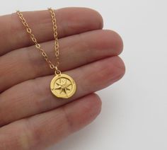 "Gold compass necklace. Perfect gift for the special graduate in your life! This also makes a great everyday necklace for yourself or a great gift for retirement, traveling, friend that is moving, or starting a new journey. The small charm is 11mm, almost 1/2\", see the 4th picture for size. The charm is gold vermeil which is 24k gold plate over sterling silver. The chain, lobster clasp and findings are all 14k Gold Filled. Select your desired length from the drop down menu, 15, 16, 17, 18, 19 o Gold Compass Necklace, Graduation Jewelry, Retirement Gifts For Women, Graduation Necklace, Compass Necklace, Jewelry Tags, Graduation Gifts For Her, Small Charms, Handmade Jewelry Gift