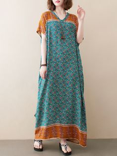 Sku CY-!86933 Material >70%Cotton Style Loose , Batwing Sleeves Feature Floral Printed , Contrast Color Neckline V-neck Occasion Casual , Simple , Vintage Seasons Summer Type Maxi Dresses Color GREEN Size FREE SIZE Please consult the size chart we provide for this item's measurements to help you decide which size to buy.Please note: There may be 1-3cm differ due to manual measurement.CMINCH Bust Length FREE SIZE 150 130 Green V-neck Shift Maxi Dress, Summer Green Shift Maxi Dress, Green Shift Maxi Dress With V-neck, Green Printed V-neck Maxi Dress, Green Shift Maxi Dress, Green Vintage Dress For Vacation, Green Vintage V-neck Maxi Dress, Green Vintage Maxi Dress For Summer, Vintage Green V-neck Maxi Dress