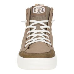 HEYDUDE | Women's Sneakers | Cody Hi Womens Canvas - Walnut | Size 7 - Your new go-to high top moc. The Cody Hi Canvas features a retro inspired canvas top, embroidered detail and elevated suede toe bumper. Heel webbing loops for easy-on and off, removable cushy foam insole and lightweight flex outsole to bring the comfy and convenience. Don’t leave these kicks on the bench.Shoe Specs: Slip-On Stretch Lace Retro inspired Textile top Embroidered detailing Synthetic toe bumper Easy-on heel webbing Casual High-top Sneakers For Urban Adventures, Urban Lace-up High-top Sneakers, Urban High-top Lace-up Sneakers, Urban Style High-top Lace-up Sneakers, Urban Style Lace-up High-top Sneakers, Sporty Brown Canvas High-top Sneakers, Sporty Brown High-top Canvas Sneakers, Hey Dude Shoes Women, Slip On Shoes For Women