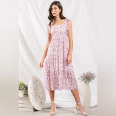 Beautiful Pink Floral Midi Dress That Ties Up At The Shoulder. Purple Floral Print Sundress For Spring, Spring Floral Print Purple Sundress, Spring Pink Midi Dress With Tie Straps, Spring Purple Floral Print Sundress, Purple Sundress For Spring, Purple Spring Sundress, Feminine Spring Midi Dress With Tie Straps, Purple Spring Sundress Midi Dress, Spring Sundress With Tie Straps For Casual Wear