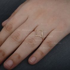 This ring is made with Hollow Rhombus Shape Two Way Chevron Band Ring Solid 14K Yellow Gold Handmade Delicate Dainty Ring NY_Minimalist Jewelry Gift. * SKU: SGR01383 * Made to Order. * Gold Purity: 18K Solid Yellow Gold (stamped) * Custom Gold Color: Yellow, Rose, White Gold * Custom Gold Purity: 9K/14K/18K (Charges Apply) Product Measurements:- Ring Size: 2 to 10 (All sizes available) ✦ Size can be customized as per your request, please mention the required size in buyer notes (Charges may appl Modern Diamond-shaped Promise Ring, Minimalist Geometric Jewelry In 14k Gold, Minimalist 14k Gold Geometric Jewelry, Minimalist Geometric 14k Gold Jewelry, Minimalist Diamond-shaped Jewelry For Anniversary, 14k Gold Diamond-shaped Ring, 14k Gold Diamond-shaped Ring Fine Jewelry, 14k Gold Diamond-shaped Diamond Ring As Gift, Geometric 14k Gold Jewelry