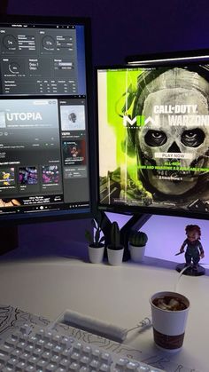 two computer monitors sitting next to each other on top of a white desk with a cup of coffee in front of them