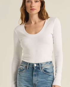 It's all sleek lines and elevated feels with the Sirena Rib Long Sleeve Tee. This perfect fitted layering piece can be worn with anything, tucked or untucked. Fitted Scoop neck Long sleeve Midweight soft wash Fabric: 95% Cotton 5% Spandex Scoop Neck Long Sleeve, Layering Pieces, Long Sleeve Tee, Layering, Scoop Neck, Long Sleeve Tees, Perfect Fit, Sleek, Spandex