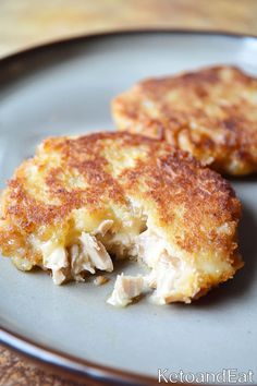 two pieces of chicken patties on a plate