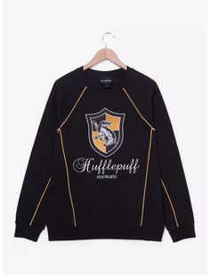 Show off your Hogwarts House pride with this Harry Potter crewneck sweater! Featuring an embroidered Hufflepuff crest above the house's name, this sweatshirt includes piping details across the front and back. Hufflepuff Crest, Monster Hoodie, Harry Potter Hufflepuff, Cozy Accessories, Smock Dress, Dress With Cardigan, Crewneck Sweater, Womens Cardigan