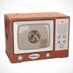 an old television with a cat's face on the screen