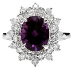 3.60 Carats Natural Amethyst and Diamond 14K Solid White Gold Ring Suggested Replacement Value: $4,700.00 Total Natural Oval Shaped Amethyst Weights: Approx. 3.00 Carats Amethyst Measures: Approx. 10 x 8mm Natural Round Diamonds Weight: Approx. 0.60 Carats (color G-H / Clarity SI1-SI2) Ring total weight: Approx. 4.3 grams Disclaimer: all weights, measurements and colors are approximate and may vary slightly from the listed dimensions or as seen in the image. All pictures are magnified to show th Amethyst And Diamond Ring, Crystal Goddess, Emerald Cut Rings, Diamond Jewelry Designs, Etsy Gold Ring, Amethyst Gem, Purple Band, Tourmaline Ring, Bling Rings