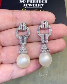 We are presenting you a HUGE pair of Art Deco, CHANDELIER, Genuine, LUSTROUS PURE WHITE, South Sea Pearls, extremely FINE AA+, LUSTROUS and Rare! Accenting the 2 pearls are 98 pieces of E/VS Natural diamonds, weighting a total of 1.58 carats. Set in GORGEOUSLY designed 18K solid white gold Art Deco earrings! PERFECT FOR SPECIAL OCCASIONS! SO BIG AND GORGEOUS! EVERYONE WILL FALL IN LOVE WITH THEM THE MINUTE THEY SEE YOU WEARING THEM! ONLY ONE ITEM AVAILABLE!! NO DUPLICATES!! WHAT YOU SEE IN THE P Luxury Diamond Pearl Earrings For Wedding, Formal White Cubic Zirconia Chandelier Earrings, White Cubic Zirconia Chandelier Earrings For Formal Events, White Cubic Zirconia Chandelier Earrings For Formal Occasions, Luxury White Round Chandelier Earrings, Luxury White Chandelier Earrings For Evening, White Diamond Bridal Earrings For Wedding, Luxury White Chandelier Earrings, Luxury White Cubic Zirconia Chandelier Earrings