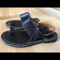 Size 8 Hand Stitched Leather Sandals From Morocco, Never Worn Casual Toe Ring Sandals With Buckle Closure, Casual T-strap Toe Ring Sandals For Spring, Spring Casual Toe Ring Sandals With Leather Sole, Casual Adjustable Closed Toe Ring Sandals, Adjustable T-strap Toe Ring Sandals For Casual Wear, Casual Open Toe Huarache Sandals With Leather Lining, Casual Leather Toe Ring Sandals For Summer, Casual Adjustable Sandals With Leather Lining, Casual T-strap Sandals With Leather Lining For Spring