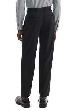 Crisp knife pleats emphasize the relaxed, roomy fit of dress pants that are tailored from soft wool and crafted with a touch of stretch to keep you moving comfortably. 32" inseam; 17 1/2" leg opening; 12 1/5" front rise; 16" back rise Zip fly with hook-and-bar closure Front slant pockets; back button-welt pockets Partially lined 97% virgin wool, 3% spandex Dry clean Imported Knife Pleats, Wool Pants, Minimalist Aesthetic, Wool Dress, Soft Wool, Welt Pockets, Dress Pants, Black Pants, Fitness Models