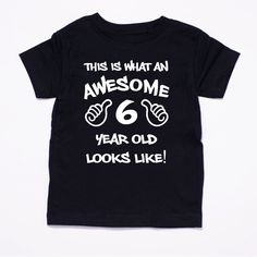 This is what an awesome 6 year old looks like Birthday Tee ►DETAILS◄ Design is applied to a super soft t shirt using fashion vinyl. ►SIZING◄ Our kids tees are available in infant sizes from 6 months to youth XL. All shirts are unisex sizing. Infant Sizes 6M - 12 1/2 inch length---=-------9 3/4 inch width 12M - 13 inch length---------------10 1/4 inch width 18M - 13 1/2 inch length----------10 3/4 inch width 24M - 14 inch length----------------11 inch width The infant shirts run on the small side Basic Graphic Print Top For Birthday, Funny Black Tops For Birthday, Custom Birthday Shirts, Kids Tees, Shirt Making, School Tees, Boss Quotes, Birthday Tee, Kids Graphic Tees