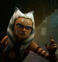 an animated star wars character with blue eyes and brown hair, holding her hand up