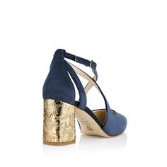 Description
Sizing / Details
Shipping / Return




NAVY BLUE VELVET CLOSED TOE SHOE, WITH CROSSED STRAPS ON THE INSTEP AND WIDE GOLD BROCADE HEEL.


 Distinguished and stylish court shoe

The Midnight Blue navy heeled shoes are a design that is as elegant as it is timeless , and are on their way to becoming our new top-selling classic. A feminine silhouette , with a comfortable fit for all types of feet, will be the most flirtatious and distinguished complement to your look.

 What makes them special:

With crossed straps on the instep and finished in a fine point, it is one of our most classic models. Using the brocade heel effect technique , the design emulates the look of luxurious textiles from past centuries, as a tribute to classical art and its relationship with the universe of the