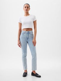 Fit: A slim, ankle-length classic.  More room than our True Skinny, but just as comfortable.  Fabric: 87% Cotton, 7% Recycled Materials, 5% Polyester, 1% Stretch.  Stretch: Stretch Jeans.  A bit of hug & a lot of hold.  Comfortable & designed to flatter.  Rise: High Rise Jeans.  Look: A classic five-pocket jean in a light indigo wash Details: Zip fly, five-pocket styling, holds-you-in front pockets, & raw hem.  Responsibly Made: This pair of jeans is part of our water-saving Washwell program.  C Fitted Straight Leg Bottoms For Everyday, Fitted Cropped Leg Pants For Everyday, Fitted Straight Leg Pants For Everyday, Fitted Cropped Leg Jeans For Spring, Casual Slim Elastane Bottoms, Fitted Cropped Jeans For Spring, Fitted Elastane Bottoms For Everyday Wear, Basic Fitted Straight Leg Bottoms, Fitted Pants With Five Pockets For Everyday