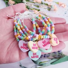 This Sweet Heart Bracelets are the perfect cute gift for all the special girls in your life. For other Valentines bracelet designs click on the link below: https://www.etsy.com/listing/1390110680 https://www.etsy.com/listing/1404334779 https://www.etsy.com/listing/1404336861 This listing is for your choose of one bracelet either in the child size or the adult size. It is adjustable and made with very strong and durable nylon string.  It is strung with pastel colored rainbow beads, silver plated Cute Personalized Jewelry For Party Favors, Multicolor Bracelets For Birthday And Valentine's Day, Multicolor Friendship Bracelets For Birthday And Valentine's Day, Playful Multicolor Beaded Bracelets For Valentine's Day, Cute Heart Beaded Bracelets For Valentine's Day, Cute Heart-shaped Beaded Bracelets For Valentine's Day, Cute Heart Beads Charm Bracelet For Valentine's Day, Cute Heart Beads Beaded Bracelets For Valentine's Day, Cute Charm Bracelet For Birthday And Valentine's Day