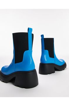 A lugged sole and chunky heel lend a utilitarian update to a classic Chelsea boot. Synthetic upper, lining and sole Imported Blue Round Toe Platform Boots For Winter, Blue Winter Platform Boots With Round Toe, Blue Round Toe Platform Boots For Fall, Fall Blue Platform Boots With Round Toe, Blue Ankle Boots For Work, Blue Round Toe Workwear Boots, Blue Workwear Boots With Round Toe, Blue Boots With Lug Sole And Round Toe, Blue Chelsea Boots