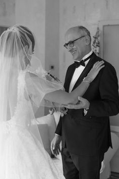 a man in a tuxedo and woman in a wedding dress