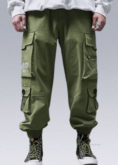 Green Cotton Techwear Cargo Pants, Green Techwear Bottoms For Streetwear, Techwear Trousers With Patch Pockets, Techwear Bottoms With Patch Pockets For Streetwear, Techwear Bottoms With Patch Pockets For Outdoor, Techwear Bottoms With Patch Pockets For Outdoor Activities, Techwear Streetwear Pants With Patch Pockets, Green Techwear Pants With Cargo Pockets, Green Techwear Bottoms With Multiple Pockets