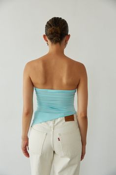 Slip into color in the Callie Asymmetrical Twist Front Tube Top for a splash of Summer freshness! This crop top features a twist front detail, asymmetrical hem, and tube top fit! Available in Bright Yellow and Aqua Blue; pair this top with your go-to denim to polish off the outfit!Details: 95% Polyester, 5% Spandex Lots of Stretch Hand Wash Cold/ Line Dry Fitted Bandeau One Shoulder Top For Summer, Summer One Shoulder Foldover Top, Stretch One Shoulder Summer Top With Foldover, Summer Stretch One Shoulder Top With Foldover, Trendy Stretch Top With Twist Front, Trendy Stretch Tops With Twist Front, Trendy Stretch Twist Front Tops, Trendy Fitted Top With Twist Front, Chic One Shoulder Foldover Top For Summer