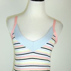 New With Tags Diesel 100% Cotton Knit Sweater Top Size Small..Blue Pink White Green And Black Horizontal Stripes..Made In Italy Cotton/Acrylic Blend..Sleeveless Embroidered Pink Floral..Versatile And Super Cute! Condition: New With Tags Measures Bust 30 Length 18.5 Multicolor V-neck Knit Top, Multicolor Casual Tank Top For Loungewear, Casual Multicolor Tank Top For Loungewear, Multicolor Seamless Tops, Multicolor Knit V-neck Top, Striped V-neck Tank Top For Spring, Multicolor Sleeveless Knit Top For Spring, Fitted Striped Knit Tank Top, Spring Striped Knit Tank Top