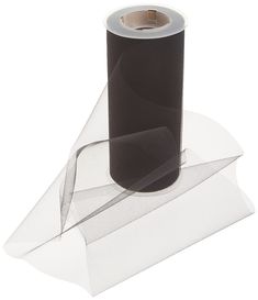 a roll of black and white sheer ribbon on top of a piece of clear mesh