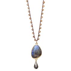 A large labradorite in 925 Sterling silver vermeil plating with a pyrite drop on a macrame chain with gold plated beads. 22" chain. Gold Labradorite Gemstone Beaded Necklace, Gold Beaded Necklace With Labradorite Stones, Gold Hand Knotted Necklace For Gift, Gold Hand-knotted Necklace For Gift, Bohemian Hand Knotted Gold Jewelry, Gold Labradorite Crystal Necklace With Gemstone Beads, Gold Labradorite Necklaces With Natural Stones, Gold Crystal Necklaces With Gemstone Beads, Gold Necklaces With Natural Labradorite Stones