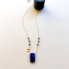 We think Lapis Lazuli is just about one of the coolest stones. We spent months finding this one for the perfect deep blue color cut to reflect the light. This unique version is handmade, of course, and designed to be layered with multiple styles in our collection. 14k gold plated with a spring ring clasp and adjustable length 16-18". Luxury Elegant Lapis Lazuli Necklace, Dainty Blue Sapphire Jewelry, Everyday Gold Sapphire Jewelry, Minimalist Sapphire Jewelry Gift, Minimalist Sapphire Jewelry As Gift, Minimalist Sapphire Jewelry For Gift, Dainty Blue Gemstone Jewelry, Blue Spiritual Birthstone Jewelry, Modern Blue Sapphire Jewelry