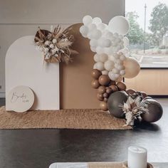 a table with balloons and decorations on it