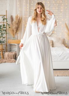 Elegant V-neck Bridal Dress, Elegant White Wrap Maxi Dress, Flowy Spring Wedding Gown, Spring Wedding Flowy Gown, Feminine Wedding Robe With Kimono Sleeves, Fitted White V-neck Robe, Elegant Bridesmaid Wrap Gown, Spring Wedding Dress With Kimono Sleeves, Elegant Wrap Bridesmaid Gown