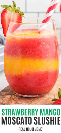 strawberry mango moscato slushie in a glass with strawberries