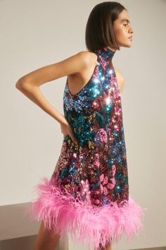 Style: Mini DressFabric: SequinLength: MiniNeckline: HalterneckSleeve Length: Sleeveless Feather Dress Party, Feather Trimmed Dress, Embellished Birthday Dress, Holographic Sequin Dress, Feather Sequin Dress, Disco Party Outfit Women, Leopard Sequin Dress, Disco Party Outfit, Look Disco