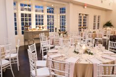 tables and chairs are set up for a wedding reception at the inn on main street