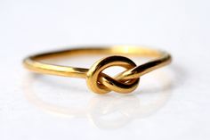 Check our full collection here: https://ajewelryconcept.etsy.com 🌍 FREE DHL Express SHIPPING WORLDWIDE, Delivery in just 2-3 days Hercules Knot A handmade ring, gold wire 1,5 mm K18, plain and simple unique jewelry. Unique design, a ring that combines Ancient Greek style and Contemporary jewellery. It can also be made of Sterling Silver gold plated. MATERIALS: Gold wire 1,5 mm K18 HANDMADE: Every piece is crafted by hand at my workshop, meaning there may be minor deviations from the picture. I Modern Twist Recycled Gold Jewelry Gift, Modern Twist Recycled Gold Jewelry For Gift, Modern Handmade Wedding Jewelry, Modern Twist Jewelry With Ring Detail Gift, Modern Twist Jewelry With Ring Detail As Gift, Modern Jewelry With Ring Detail As A Gift, Handmade Rings With A Modern Twist For Weddings, Handmade Minimalist Infinity Rings, Minimalist Handmade Infinity Rings