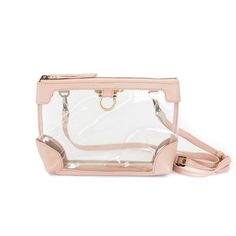 With a multi-purpose design, our Sharon Clear Crossbody is an essential. This clear bag has endless uses—as a clear bag for stadiums, or remove the strap and use for makeup , toiletries, diaper bag essentials, or as a storage option inside larger handbags, totes, duffle bags and suitcases. Need something smaller? Look at our Sharon Mini Clear Crossbody! Features Beautiful leather trim: Our buttery soft leather trims the bag in colors you’ll want to keep packing. ﻿Removable strap: ﻿Use the includ Clear Crossbody Shoulder Bag For On-the-go, Clear Shoulder Bag With Detachable Strap For Travel, Clear Pouch Shoulder Bag For Travel, Clear Rectangular Satchel For Travel, Clear Travel Shoulder Bag, Clear Satchel Bag For Travel, Clear Travel Bag With Detachable Strap, Clear Rectangular Shoulder Bag For Travel, Clear Shoulder Bag With Removable Pouch For Travel