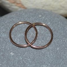 ⋙ 14kt Pink Gold Filled small hoop earrings.⋙ This listing is for two earrings.⋙ Available gauges for the earrings: 24g; 22g; 20g; 18g; 16g; 14g.⋙ Please note: the less gauge number, the thicker earrings are.⋙ Available interior (inner) diameters: 7mm; 8mm; 9mm; 10mm; 11mm; 12mm⋙ I will put your order into a beautiful jewelry box (it will be ready for gift giving). Rose Gold Round Cartilage Earrings For Everyday, Minimalist Hoop Rings With Pierced Detail, Minimalist Hoop Rings, Rose Gold Sterling Silver Piercings, Nickel-free Rose Gold Promise Ring Jewelry, Nickel-free Rose Gold Promise Ring, Rose Gold Huggie Cartilage Earrings For Anniversary, 14k Rose Gold Nose Rings, Stackable Rose Gold Hoop Jewelry