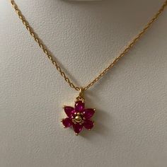 Kate Spade Cubic Zirconia Flower Mini Pendant Necklace *New With Tags *Gold-Tone Chain Necklace (16" With 3" Extender) *Gold-Tone Clear Fuchsia Pink Flower Mini Pendant (0.5" X0.5") *Includes Kate Spade Dust Bag Elegant Red Kate Spade Jewelry, Elegant Pink Flower Necklace With Clavicle Chain, Elegant Pink Kate Spade Jewelry, Pink Flower Necklace With Clavicle Chain, Pink Flower Clavicle Chain Necklace, Gold Flower Necklace For Party, Pink Flower Shaped Necklace For Party, Pink Flower Necklace For Party, Elegant Rose Red Flower Necklaces