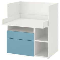 a white and blue shelf with two drawers