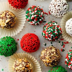 there are many different types of desserts on the table together, including one with sprinkles