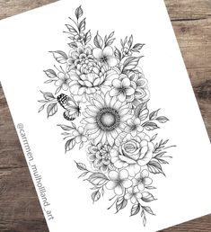 a black and white drawing of flowers on a piece of paper