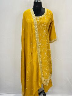 Silk Blend Mustard  Yellow Embroidered Straight Kurta With Trousers and Dupatta Indian Wedding Wear Salwar Kameez / Indian Wedding Dress / Plus Size Cotton Kurta Dress Traditional Indian Wear / Salwar Kameez Dupatta / Kurti Palazzo Set The set contains: 1 Straight Kurta 1 Trousers 1 Dupatta Kurta: The mustard yellowstraight Kurta has a round neck design with zari work details in front. The Kurta measures till calf length and has straight hemline. Sleeve length :  3/4 Sleeves Trousers :  Trousers Silk Traditional Wear With Gota Work For Party, Raw Silk Dress With Gota Work For Wedding, Raw Silk Wedding Dress With Gota Work, Wedding Dresses In Raw Silk With Gota Work, Fitted Embroidered Chinon Salwar Kameez, Embroidered Fitted Palazzo Set In Dola Silk, Fitted Embroidered Art Silk Palazzo Set, Embroidered Dola Silk Palazzo Set For Weddings, Yellow Traditional Wear For Transitional Party