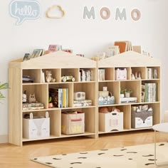 a child's room with two bookshelves and toys on the floor in front of it