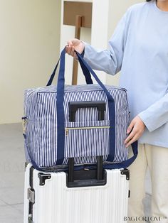 BagForLove - Stylish Striped Travel Bag with Spacious Capacity and Foldable Storage Blue Tote Travel Bag With Zipper Closure, Blue Large Capacity Shoulder Travel Bag, Trendy Blue Large Capacity Travel Bag, Large Capacity Blue Shoulder Travel Bag, Trendy Blue Travel Bag With Large Capacity, Blue Casual Travel Bag With Large Capacity, Casual Blue Travel Bag With Large Capacity, Casual Blue Large Capacity Travel Bag, Versatile Blue Bag